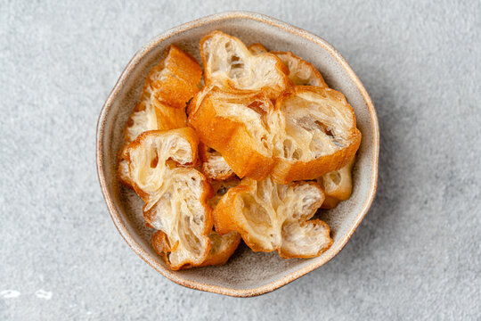 Youtiao or Yu Char Kway is a long golden-brown deep-fried strip of wheat flour dough of Chinese origin