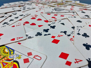 Playing cards spread out on a table
