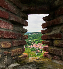 A window in a brick wall at an old fortress