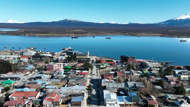 Coast Town Of Puerto Natales In Ultima Esperanza Chile. Nature Landscape. Travel Background. Ultima Esperanza Chile. Downtown Cityscape. Coast Town At Puerto Natales In Ultima Esperanza Chile.