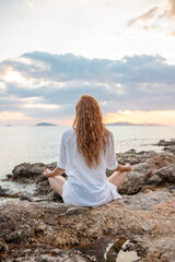 Meditation wellness on beach. Happy zen girl, spiritual fitness breathing and health for...