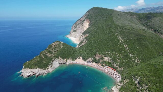 Queen's Beach ( Kraljichina Beach ) in Canj, Montenegro. Aerial view of paradise tropical beach, surrounded by green hills. Montenegro. Balkans. Europe.