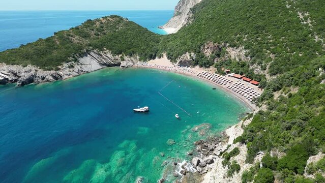Queen's Beach ( Kraljichina Beach ) in Canj, Montenegro. Aerial view of paradise tropical beach, surrounded by green hills. Montenegro. Balkans. Europe.