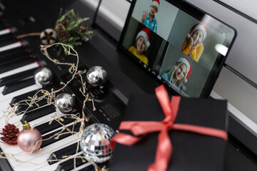 Christmas video call tablet. synthesizer, piano keys
