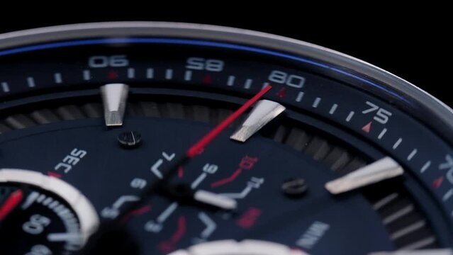 Close Up Of Stylish Luxury Man Wrist Watch With Moving Hand And Multiple Dials. Men's chronograph watch in metal with sapphire crystal. closeup view of rotating watch, running second arrow. blue dial