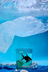 Plastic pollution in ocean environmental problem. Plastic bags and bottles pollute sea. Underwater trash.