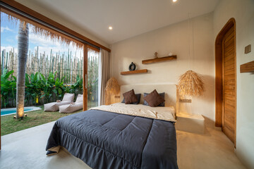 Luxury bedroom interior design for modern life style. Luxury villa with open space to garden with swimming pool