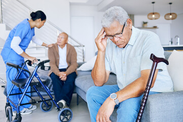 Healthcare, doctor and a man with a headache in a nursing home, depression or consultation....