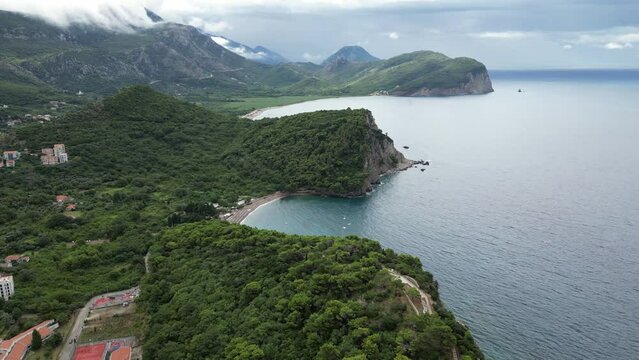 Luchica Beach Aerial View in Petrovac na Moru. Beaches and coastline of the Adriatic Sea at summer time. Natural landscapes of Montenegro. Balkans. Europe.	