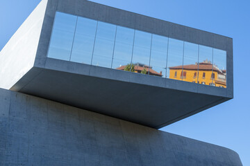 Reflection in window of modern building in Rome.  Modern museum of art