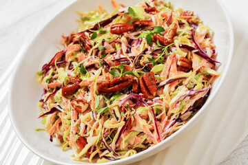 fresh coleslaw with cabbage, carrots, onion, pecan