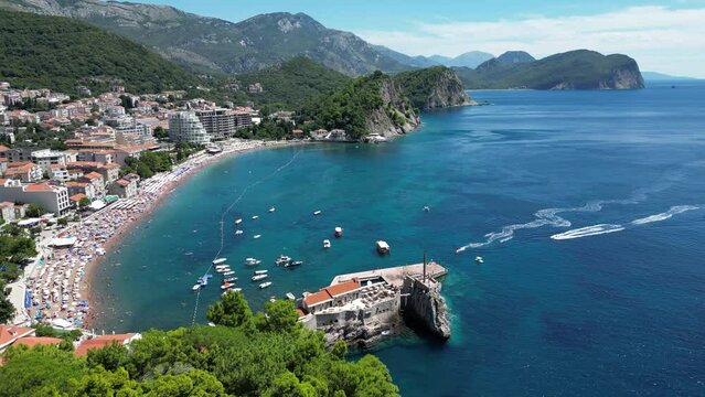 Petrovac na Moru Aerial View. Beaches and coastline of the Adriatic Sea at summer time. Natural landscapes of Montenegro. Balkans. Europe.	