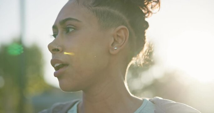 Face, breathing and tired woman outdoor with fitness, break and rest after running or intense cardio. Sports, fatigue and female runner stop for recovery, breathe and mindset focus on training run