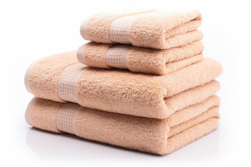 Fototapeta na wymiar A tide pile of fresh and clean towels, all folded in a bathroom