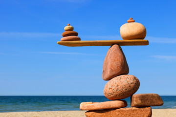 concept of life balance and harmony. Balance stones against the sea.