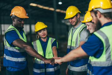 Diverse warehouse team create empowerment, confidence. Collaboration drives excellence in logistics