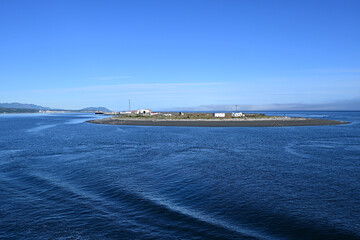 Obraz premium Coast Guard Station on Ediz Hook in Port Angeles Harbor, Washington on clear sunny summer morning.