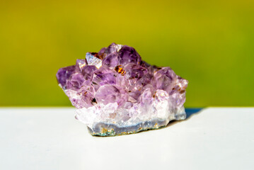 Natural mineral amethyst. Semi-precious multi-colored stones, minerals close-up. Mineralogy....