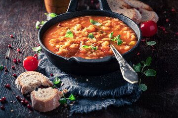 Homemade minestrone soup made of legume and vegetables.