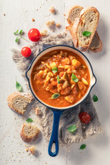 Tasty minestrone soup made of legume and vegetables.
