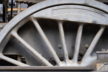 Detail of an old steam locomotive wheel