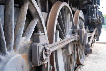 Detail of an old steam locomotive wheels