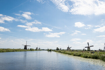 iconic smock ground sailer windmill in Kinderdijk Netherlands. Landmark buildings originally made...