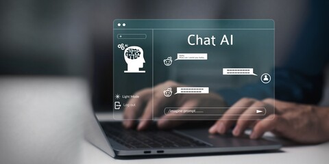 ChatGPT, Chat with AI or Artificial Intelligence technology. Man using a laptop computer chatting...