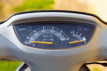 Raamstickers dashboard with speedometer on an old scooter close-up © Oleg Opryshko