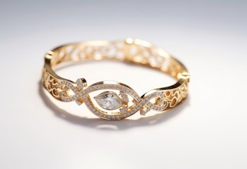 gold bracelet with diamonds on white background