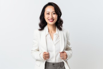 Medium shot portrait of a Chinese woman in her 30s in a white background wearing a chic cardigan