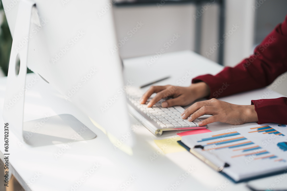 Poster Hands of businessman working on keyboard keyboard searching work document on computer screen.