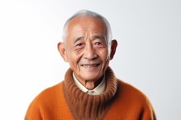 Obraz premium Portrait of a senior asian man wearing warm sweater on white background