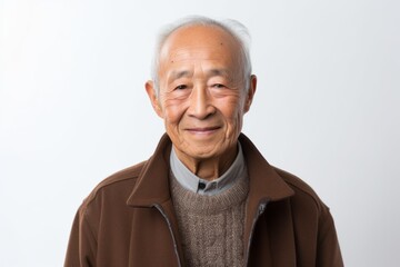Obraz premium Portrait of a senior asian man in casual clothes on white background