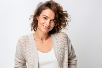 Obraz premium Portrait of a beautiful young brunette woman with curly hair.