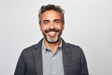 Obraz premium Medium shot portrait of a Brazilian man in his 40s in a white background wearing a chic cardigan