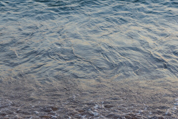 Moving blue sea water
