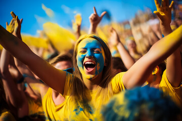 Ukrainian beach soccer fans celebrating a victory 