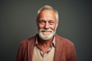 Fototapeta premium Portrait of a smiling senior man with gray hair and beard.