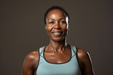 Fototapeta na wymiar Portrait of smiling african american woman in sportswear