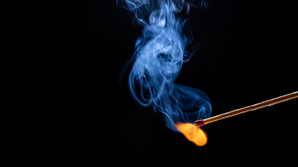 match with flame and smoke