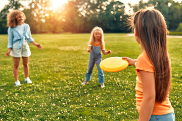 Happy family relaxing in the park