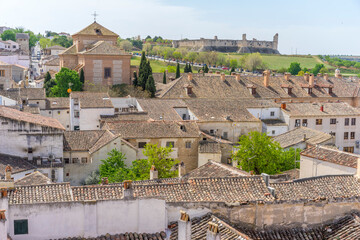 spanish plaza views, traditional rooftops, architectural details, essence of historic Chinchón captured