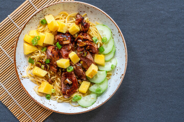 Hoisin duck with mango and egg noodles