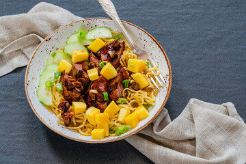 Hoisin duck with mango and egg noodles