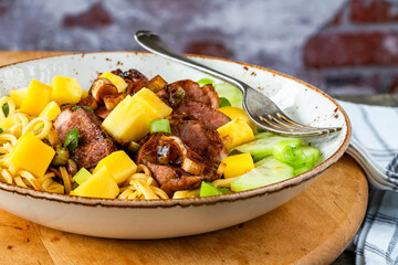 Hoisin duck with mango and egg noodles