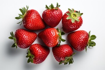 A group of strawberries on a white background, created by Generative AI