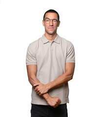 Fototapeta premium Happy young man using his hands like a binoculars