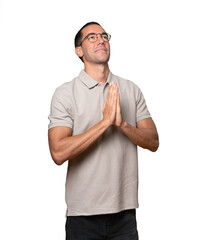 Young man making a gesture of worried about his economy