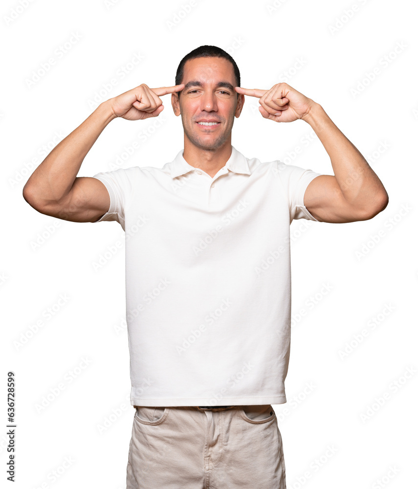 Wall mural Surprised young man doing a gesture of concentration